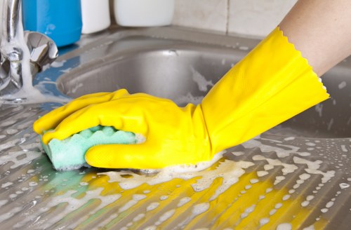 Local cleaners working in a commercial office space in N7